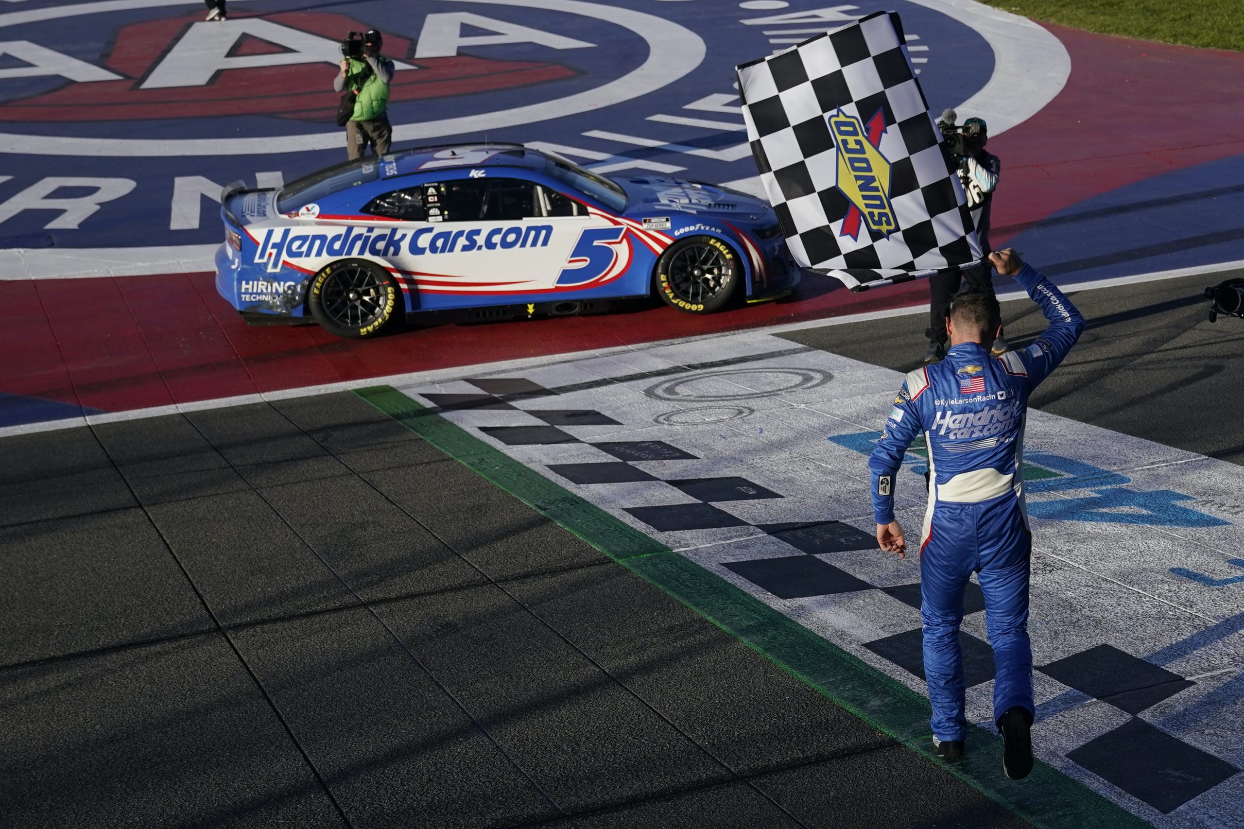 Kyle Larson triumphs in the NASCAR Cup race at Auto Club Speedway